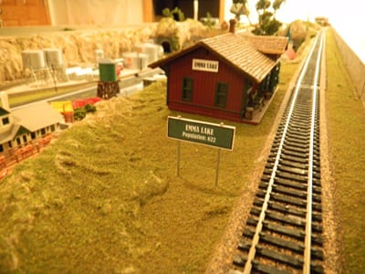 Railroads on Model Train with House