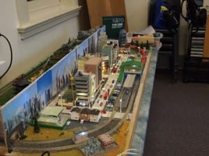Japan-themed model railroad on table against a wall