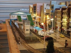 station in japan-themed railroad model at night
