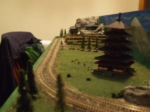 temple and mountain in Japan-themed railroad model