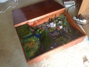 japan-themed model railroad inside a wooden box