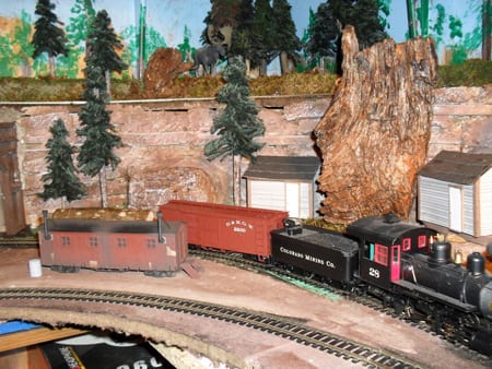 Red and white cabins of the model railroad