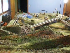 Model railroad layout on the table from the top view.