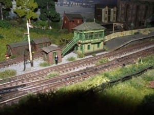 Interlocking tower scale model on the model train layout.