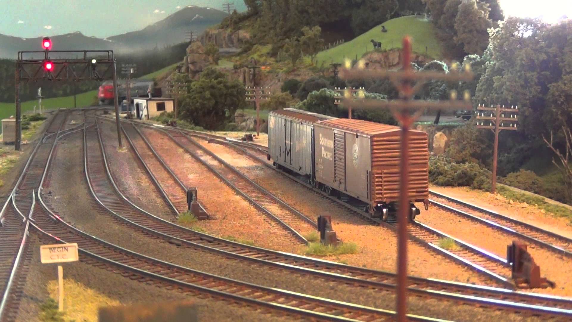 HO Model Train Layout within a Junction Video