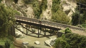 railroad bridge in model train layout