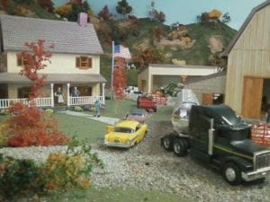 farm, tractor, truck, and house of the model railroad