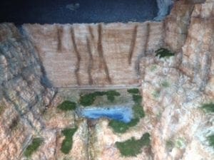 body of water in the valley of the model railroad