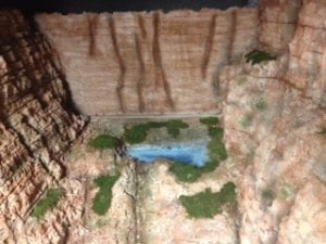 valley with body of water on model railroad layout