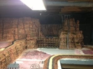 train tracks built on rock on model railroad