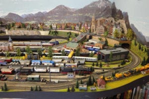 Train tracks and city of the model railroad layout.