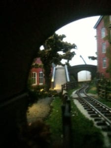 model train track from the perspective of a passenger
