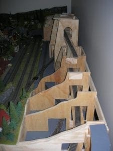 Train tracks on the wooden skeleton of the tunnel. 