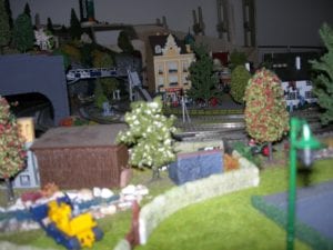Houses, trees, and streets on the model railroad layout