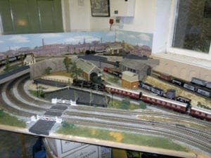 backdrop and station of model railroad 