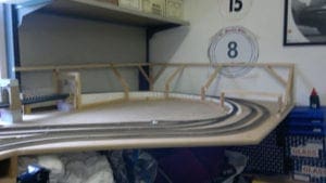 railroad tracks and frame of tunnel of unfinished railroad model