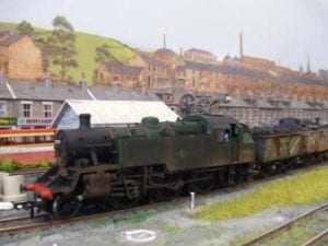 Model locomotive with freight cars.